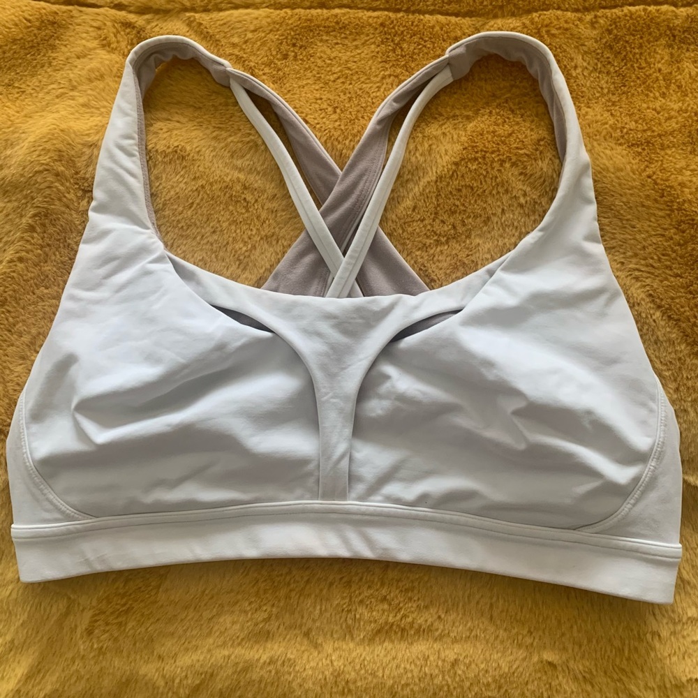 Lululemon sports bra. Lightly worn. Size 12. Bra pads removed.
